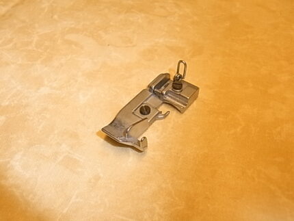 Trykfod Huskylock 560ED