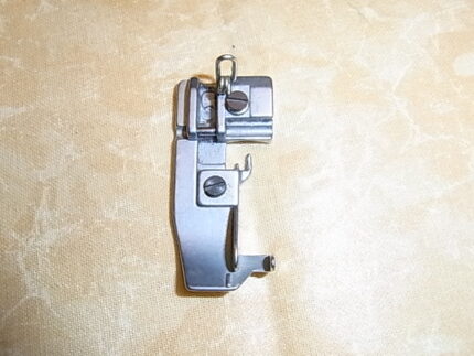 Trykfod Huskylock 560EDT