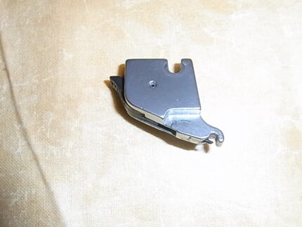 Trykfodsholder Huskylock 560EDT