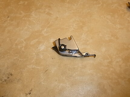 Trykfodsholder Huskylock 660CD
