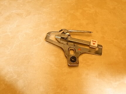 Trykfodsholder Huskylock 560ED